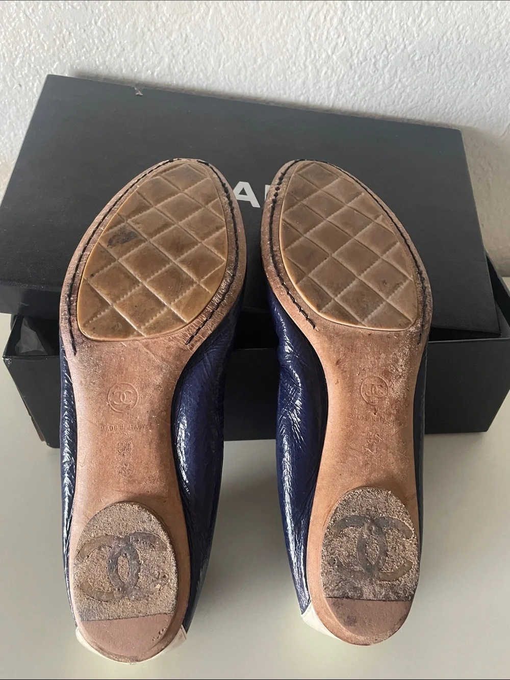 CHANEL Navy and Ivory Quilted Cap-Toe Ballet Flats